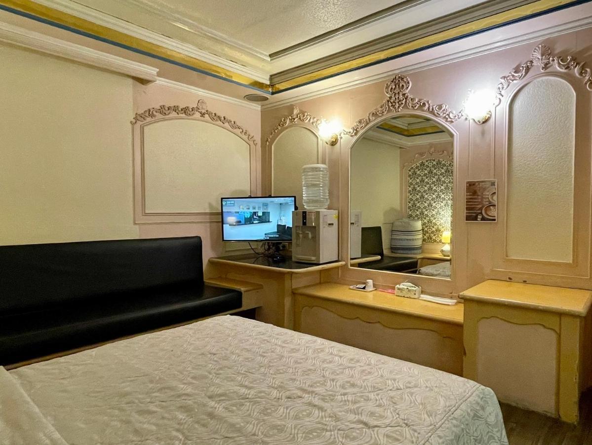 Отель 溫情自助旅店 Таоюань Экстерьер фото
