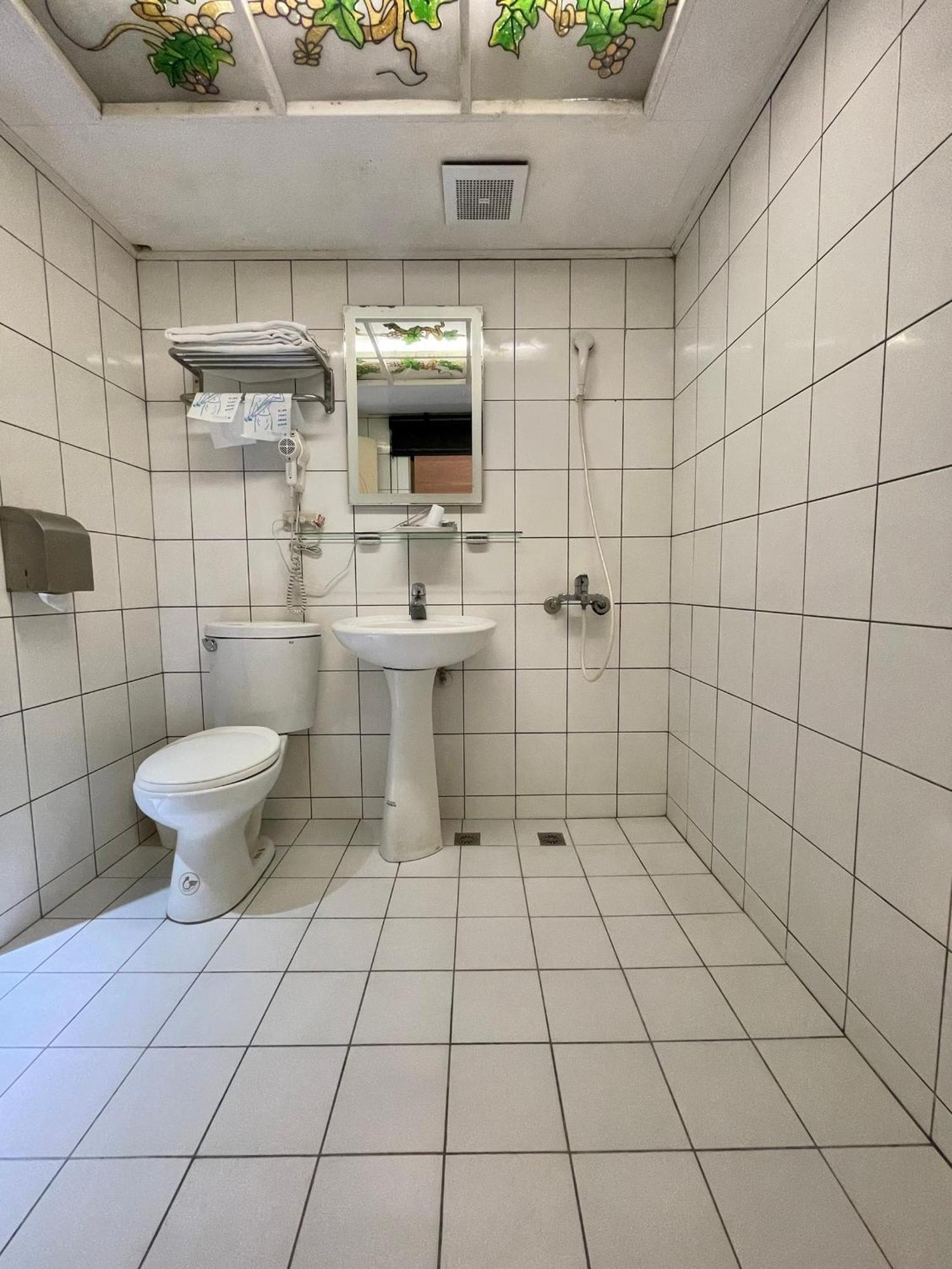 Отель 溫情自助旅店 Таоюань Экстерьер фото